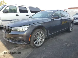 2019 BMW 7 Series 740i with VIN WBA7E2C52KB217153, listed as a Copart auction lot 65205835 with 61,981 mi miles and Clean title. Bid and sale history available at DreamBid. Image 1.