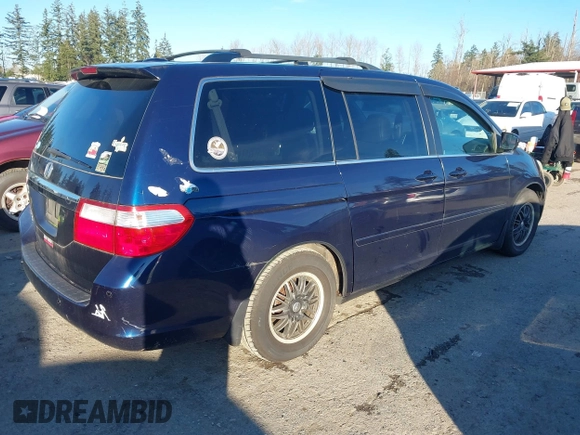 2006 Honda Odyssey TOURING with VIN 5FNRL38866B058344, listed as a IAAI auction lot 41298331 with 156,784 mi miles. Bid and sale history available at carsss.com. Image 4.