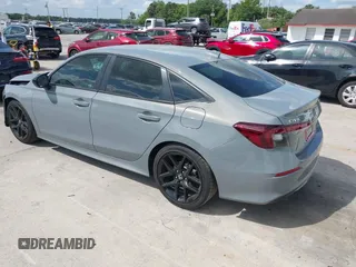 2025 Honda Civic Sport with VIN 2HGFE2F57SH571849, listed as a IAAI auction lot 41902538 with 869 mi miles and . Bid and sale history available at DreamBid. Image 3.