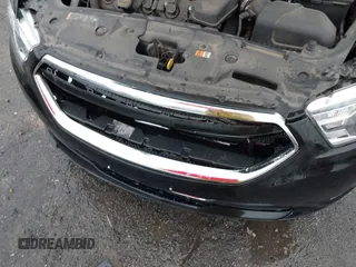 2015 Ford Taurus Limited with VIN 1FAHP2F87FG146554, listed as a IAAI auction lot 41712502 with 103,117 mi miles. Bid and sale history available at carsss.com. Image 6.