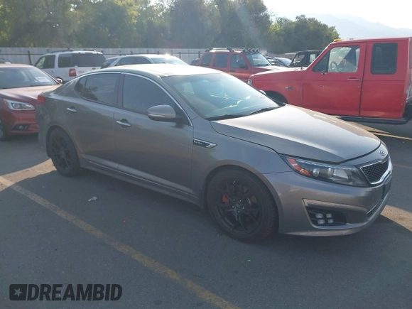 2015 Kia Optima SX Turbo with VIN 5XXGR4A61FG395148, listed as a IAAI auction lot 40313811 with 104,978 mi miles and . Bid and sale history available at DreamBid. Image 1.