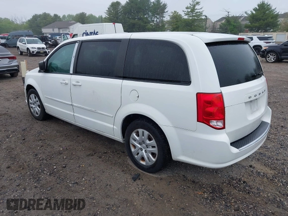 2015 Dodge Grand Caravan SE with VIN 2C4RDGBG2FR606610, listed as a IAAI auction lot 42197738 with 144,620 mi miles and . Bid and sale history available at DreamBid. Image 3.