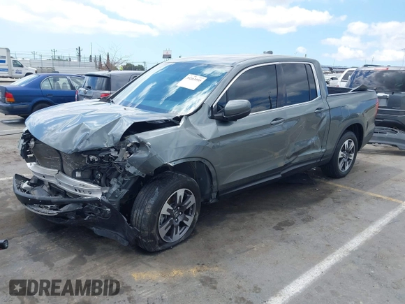 2017 Honda Ridgeline RTL-T with VIN 5FPYK2F63HB001488, listed as a IAAI auction lot 40078694 with Not provided miles and . Bid and sale history available at DreamBid. Image 2.