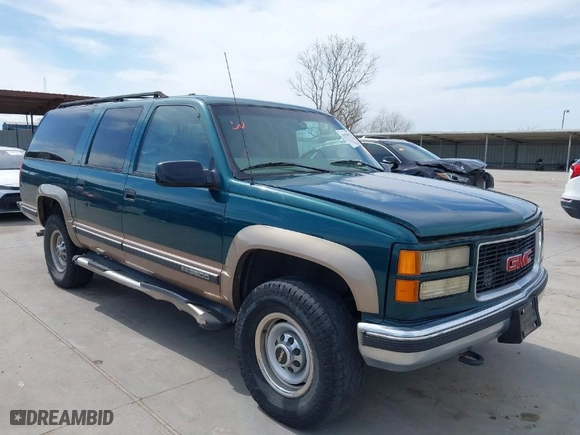 1998 GMC Suburban with VIN 1GKGK26J4WJ734958, listed as a IAAI auction lot 41878070 with 131,528 mi miles. Bid and sale history available at carsss.com. Image 1.
