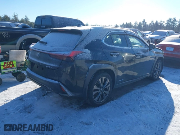 2021 Lexus UX with VIN JTHR9JBH8M2037134, listed as a IAAI auction lot 41352890 with 56,198 mi miles. Bid and sale history available at carsss.com. Image 4.