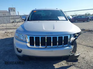 2013 Jeep Grand Cherokee Laredo with VIN 1C4RJFAG3DC586667, listed as a IAAI auction lot 42041524 with 100,635 mi miles. Bid and sale history available at carsss.com. Image 12.