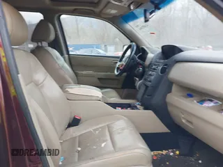 2012 Honda Pilot EX-L with VIN 5FNYF4H51CB045141, listed as a IAAI auction lot 41689396 with 219,792 mi miles and . Bid and sale history available at DreamBid. Image 5.