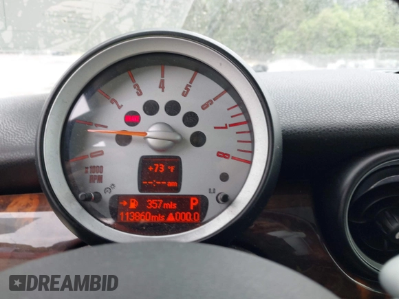 2007 MINI Hardtop S with VIN WMWMF73557TL91653, listed as a IAAI auction lot 42095562 with 113,860 mi miles and . Bid and sale history available at DreamBid. Image 7.