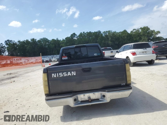 1996 Nissan Frontier XE z VIN 1N6SD11S0TC311270, wystawiony jako Copart lot #53870965 z przebiegiem 145 595 mil mil oraz Szkoda całkowita • Salvage title. Historia ofert i sprzedaży dostępna na DreamBid. Obrazek 6.