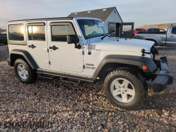2018 Jeep Wrangler JK Unlimited Sport S with VIN 1C4BJWDG6JL890665, listed as a Copart auction lot 83833854 with 23,390 mi miles and Salvage Title. Bid and sale history available at carsss.com. Image 4.