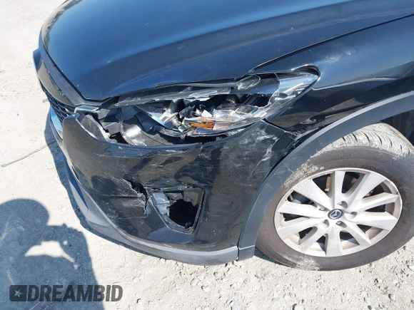 2014 Mazda CX-5 Sport z VIN JM3KE2BE2E0325715, wystawiony jako IAAI lot #42683243 z przebiegiem 262 005 mil mil oraz . Historia ofert i sprzedaży dostępna na DreamBid. Obrazek 6.
