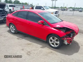 2013 Ford Focus SE z VIN 1FADP3F20DL294470, wystawiony jako IAAI lot #42202891 z przebiegiem 155 486 mil mil oraz . Historia ofert i sprzedaży dostępna na DreamBid. Obrazek 1.