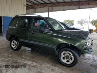 2000 Suzuki Vitara JLS z VIN 2S3TE52VXY6110157, wystawiony jako Copart lot #79173714 z przebiegiem 165 283 mil mil oraz Nie do naprawy. Historia ofert i sprzedaży dostępna na DreamBid. Obrazek 4.