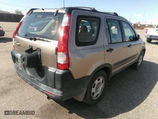 2005 Honda CR-V LX with VIN SHSRD78525U333497, listed as a IAAI auction lot 42004518 with 210,914 mi miles. Bid and sale history available at carsss.com. Image 4.
