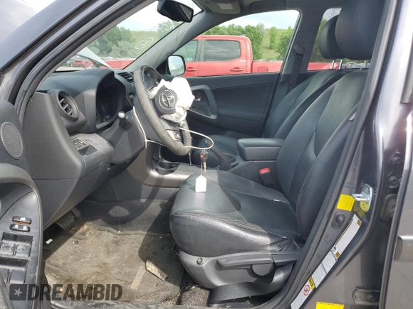 2011 Toyota RAV4 Sport with VIN JTMRK4DV2B5105756, listed as a Copart auction lot 61230365 with 145,626 mi miles and Salvage title. Bid and sale history available at DreamBid. Image 7.