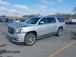 2015 GMC Yukon XL SLT z VIN 1GKS2HKCXFR618783, wystawiony jako IAAI lot #42081053 z przebiegiem 230 368 mil mil oraz . Historia ofert i sprzedaży dostępna na DreamBid. Obrazek 18.