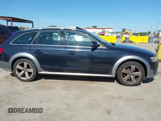 2014 Audi allroad A4 Premium Plus z VIN WA1UFAFL1EA151304, wystawiony jako IAAI lot #42387022 z przebiegiem 98 225 mil mil oraz . Historia ofert i sprzedaży dostępna na DreamBid. Obrazek 13.