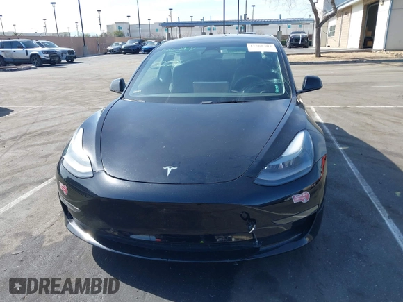 2022 Tesla Model 3 Long Range with VIN 5YJ3E1EB1NF133356, listed as a IAAI auction lot 41568303 with 73,406 mi miles and . Bid and sale history available at DreamBid. Image 10.