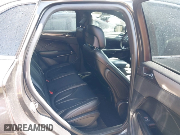 2017 Lincoln MKC Premiere with VIN 5LMCJ1C91HUL68453, listed as a IAAI auction lot 41972883 with 75,363 mi miles and . Bid and sale history available at DreamBid. Image 8.