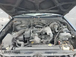 2001 Toyota Tacoma z VIN 5TEVL52N31Z723068, wystawiony jako Copart lot #58333945 z przebiegiem 302 695 mil mil oraz Czysty tytuł • Clean title. Historia ofert i sprzedaży dostępna na DreamBid. Obrazek 11.