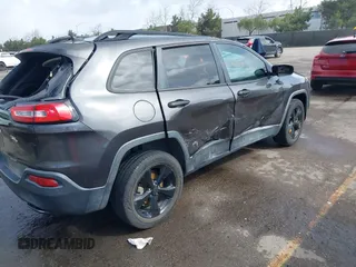 2017 Jeep Cherokee Sport with VIN 1C4PJLAB8HW527354, listed as a IAAI auction lot 41578066 with 124,339 mi miles. Bid and sale history available at carsss.com. Image 4.