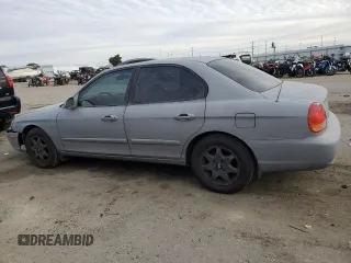 2001 Hyundai Sonata GLS with VIN KMHWF35VX1A372516, listed as a Copart auction lot 76357494 with 170,642 mi miles and Salvage Title. Bid and sale history available at carsss.com. Image 2.