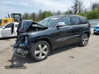 2014 Jeep Grand Cherokee Limited with VIN 1C4RJFBT0EC410818, listed as a Copart auction lot 59967155 with 129,880 mi miles and Salvage title. Bid and sale history available at DreamBid. Image 1.