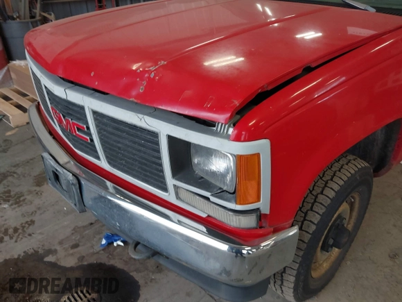 1993 GMC Sierra 1500 z VIN 1GTEK14H0PE542993, wystawiony jako IAAI lot #41833743 z przebiegiem 225 085 mil mil oraz . Historia ofert i sprzedaży dostępna na DreamBid. Obrazek 17.