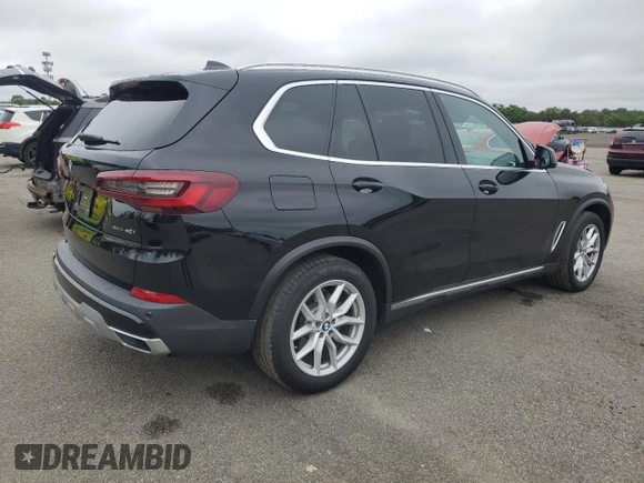2020 BMW X5 xDrive40i with VIN 5UXCR6C09L9C95232, listed as a Copart auction lot 60697765 with 30,017 mi miles and Salvage title. Bid and sale history available at DreamBid. Image 3.