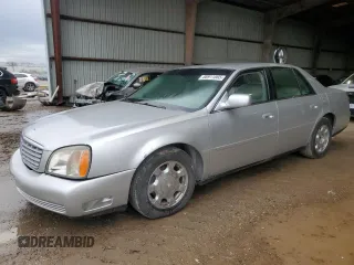2001 Cadillac DeVille z VIN 1G6KD54Y41U219423, wystawiony jako Copart lot #88911565 z przebiegiem 118 487 mil mil oraz Czysty tytuł • Clean title. Historia ofert i sprzedaży dostępna na DreamBid. Obrazek 1.