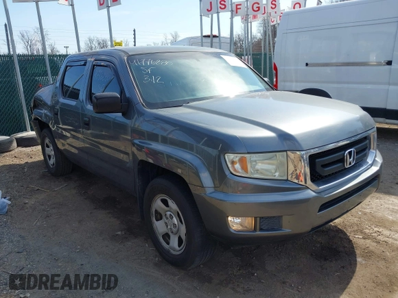 2011 Honda Ridgeline RT z VIN 5FPYK1F26BB453191, wystawiony jako IAAI lot #41776280 z przebiegiem 122 908 mil mil oraz . Historia ofert i sprzedaży dostępna na DreamBid. Obrazek 1.
