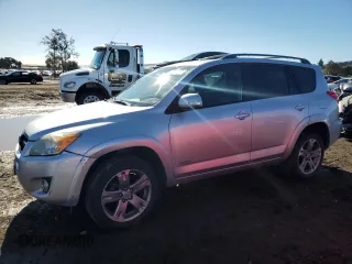 2011 Toyota RAV4 Sport with VIN JTMRF4DV5B5037697, listed as a Copart auction lot 82259164 with 99,215 mi miles and Salvage title. Bid and sale history available at DreamBid. Image 1.