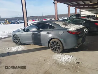 2021 Mazda 6 Carbon Edition with VIN JM1GL1WY6M1616617, listed as a IAAI auction lot 41365615 with 60,747 mi miles and . Bid and sale history available at DreamBid. Image 14.
