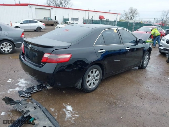 2007 Toyota Camry CE with VIN JTNBE46K273026484, listed as a IAAI auction lot 41962311 with 92,094 mi miles. Bid and sale history available at carsss.com. Image 4.