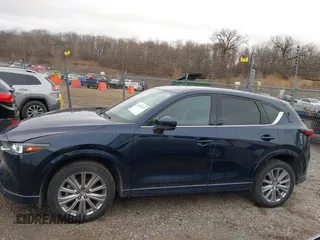 2023 Mazda CX-5 Signature with VIN JM3KFBXY5P0251046, listed as a IAAI auction lot 41505815 with 37,594 mi miles and . Bid and sale history available at carsss.com. Image 14.