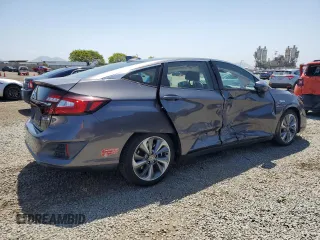 2018 Honda Clarity Touring z VIN JHMZC5F36JC014495, wystawiony jako Copart lot #56139675 z przebiegiem 75 020 mil mil oraz Szkoda całkowita • Salvage title. Historia ofert i sprzedaży dostępna na DreamBid. Obrazek 3.