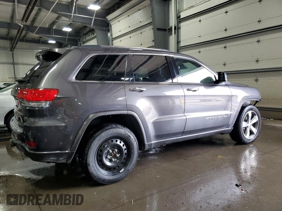 2016 Jeep Grand Cherokee Overland with VIN 1C4RJFCG9GC345309, listed as a Copart auction lot 61095285 with 115,968 mi miles and Salvage title. Bid and sale history available at DreamBid. Image 3.