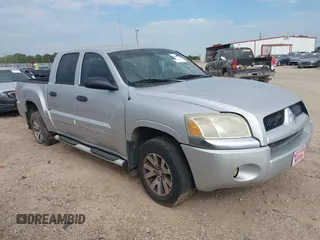 2007 Mitsubishi Raider LS z VIN 1Z7HC28K07S126180, wystawiony jako IAAI lot #42206291 z przebiegiem 227 143 mil mil oraz . Historia ofert i sprzedaży dostępna na DreamBid. Obrazek 1.