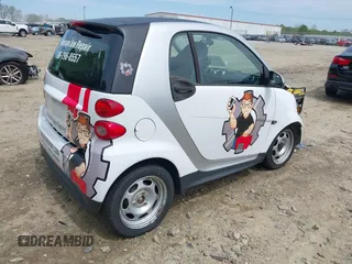 2014 Smart fortwo Pure with VIN WMEEJ3BA2EK733819, listed as a IAAI auction lot 42041305 with 69,018 mi miles and . Bid and sale history available at DreamBid. Image 4.