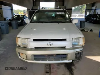 2001 Infiniti QX4 Luxury z VIN JNRDR09Y81W219674, wystawiony jako Copart lot #74221844 z przebiegiem 167 787 mil mil oraz Szkody całkowita. Historia ofert i sprzedaży dostępna na DreamBid. Obrazek 5.