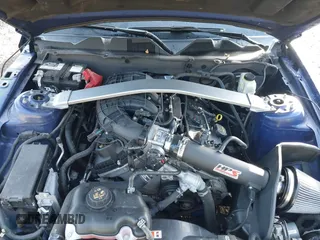 2014 Ford Mustang V6 with VIN 1ZVBP8EM2E5243069, listed as a IAAI auction lot 41725527 with 113,692 mi miles. Bid and sale history available at carsss.com. Image 10.