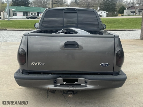 2003 Ford F-150 Lightning with VIN 2FTRF073X3CA56501, listed as a IAAI auction lot 42083560 with 112,754 mi miles. Bid and sale history available at carsss.com. Image 12.