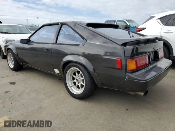 1985 Toyota Supra с VIN JT2MA67L3F0151708, выставлен на аукционе Copart как лот 74672844 с пробегом 60 346 миль миль и Списание • Salvage title. История ставок и продаж доступна на DreamBid. Изображение 2.