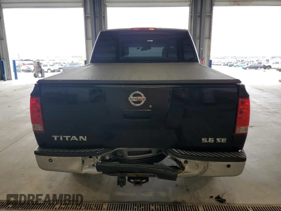 2006 Nissan Titan SE с VIN 1N6AA07B46N566356, выставлен на аукционе Copart как лот 54855565 с пробегом 221 595 миль миль и Списание • Salvage title. История ставок и продаж доступна на DreamBid. Изображение 6.