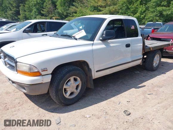 1998 Dodge Dakota SLT z VIN 1B7GL22X9WS620905, wystawiony jako IAAI lot #42388299 z przebiegiem 146 315 mil mil oraz . Historia ofert i sprzedaży dostępna na DreamBid. Obrazek 2.
