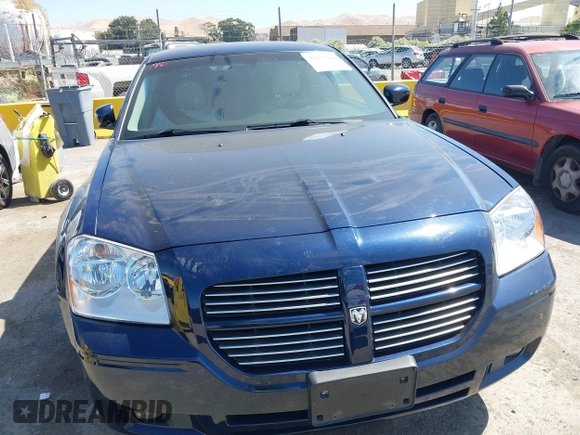 2005 Dodge Magnum z VIN 2D8GZ58255H656450, wystawiony jako IAAI lot #42475944 z przebiegiem 80 098 mil mil oraz . Historia ofert i sprzedaży dostępna na DreamBid. Obrazek 6.