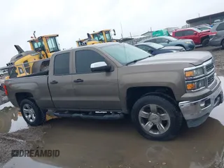 2014 Chevrolet Silverado 1500 LTZ with VIN 1GCVKSEC5EZ249444, listed as a IAAI auction lot 41904569 with 123,650 mi miles and . Bid and sale history available at DreamBid. Image 14.