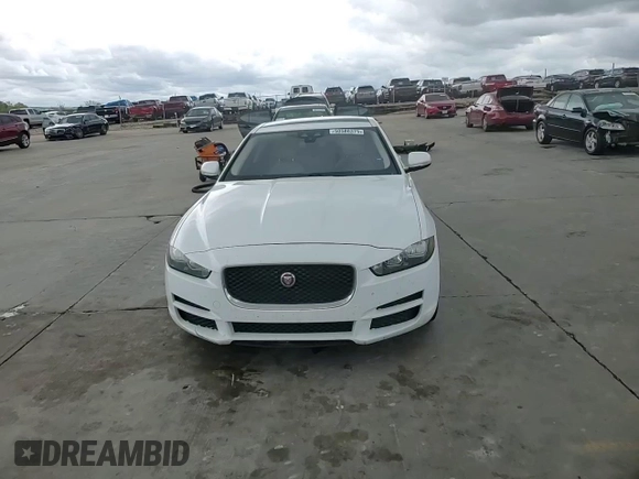 2018 Jaguar XE 25t with VIN SAJAR4FX4JCP31280, listed as a Copart auction lot 50580375 with 125,060 mi miles and Salvage Title. Bid and sale history available at DreamBid. Image 11.