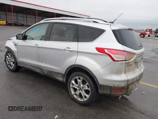 2015 Ford Escape Titanium with VIN 1FMCU9J97FUA84589, listed as a IAAI auction lot 41688156 with 129,073 mi miles. Bid and sale history available at carsss.com. Image 3.