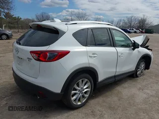 2014 Mazda CX-5 Grand Touring with VIN JM3KE4DY8E0397330, listed as a IAAI auction lot 41868116 with 180,891 mi miles. Bid and sale history available at carsss.com. Image 4.